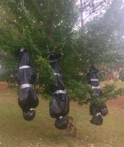 fake diy halloween body bag|hanging a halloween corpse.